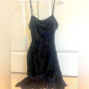 Black “Free People” mini dress with blue floral pattern!